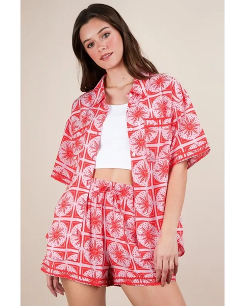 Babe Beachwear vacation printed top and shorts outfit in red and white geometric pattern