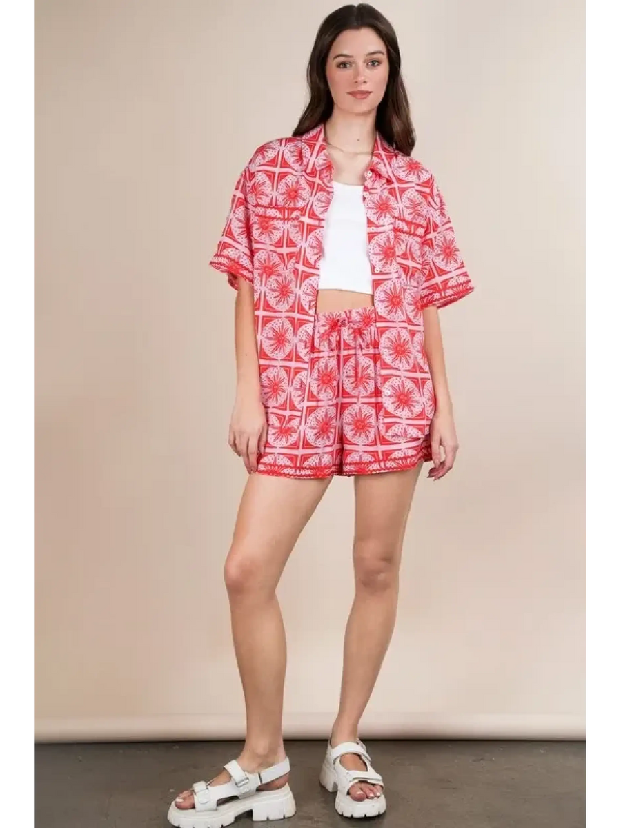Babe Beachwaer vacation printed top and shorts outfit in red and white with tropical patterns