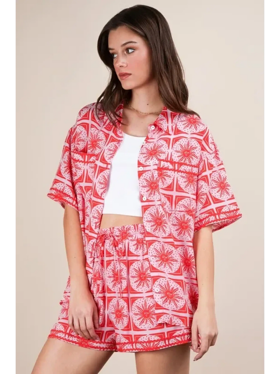 Babe Beachwear vacation printed top and shorts outfit in red and white tropical pattern