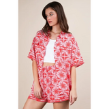 Babe Beachwear vacation printed top and shorts outfit in red and white tropical pattern