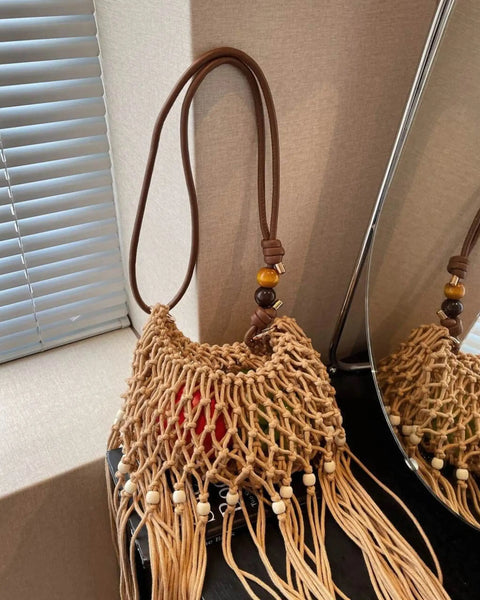 Babe Beachwear vacation-ready boho handbag with woven design and wooden bead accents