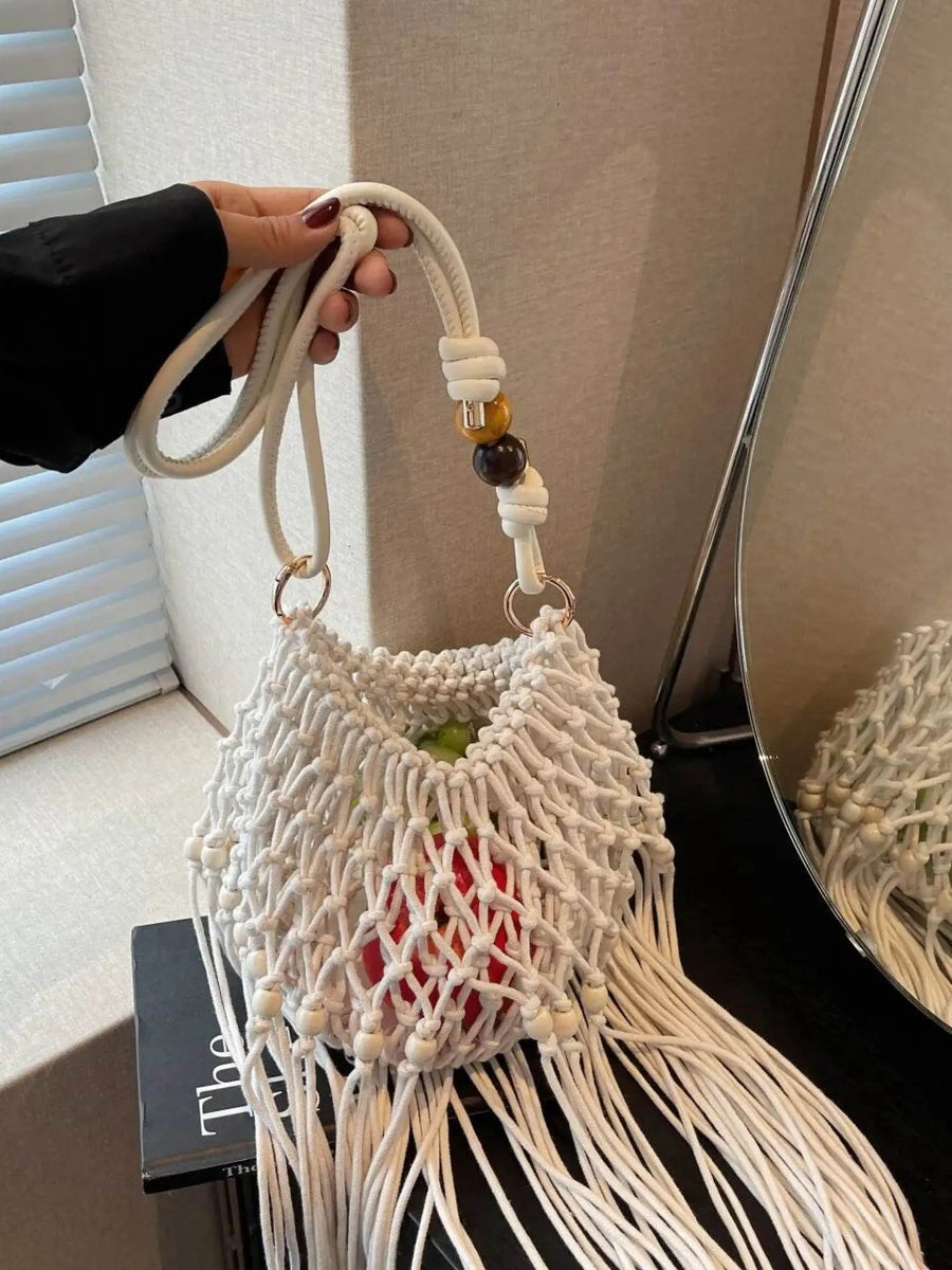Babe Beachwear vacation-ready boho handbag white macrame design with tassels and wooden bead accents