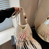 Babe Beachwear vacation-ready boho handbag white macrame design with tassels and wooden bead accents