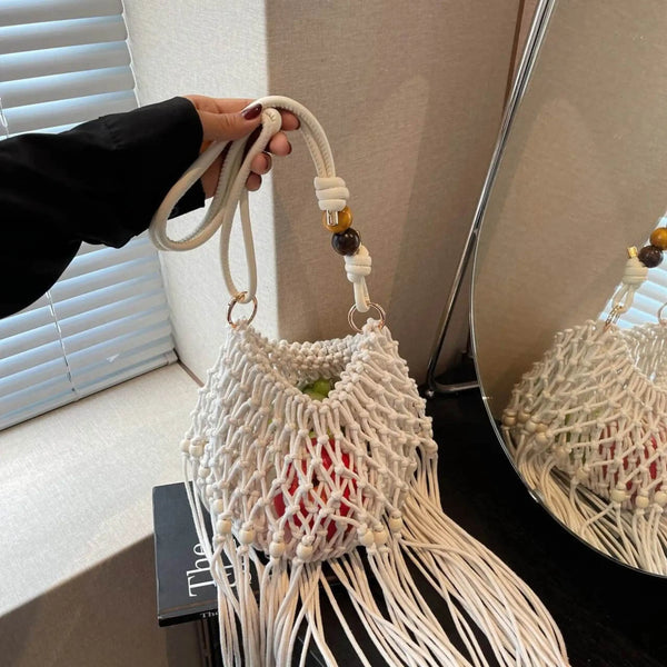 Babe Beachwear vacation-ready boho handbag white macrame design with tassels and wooden bead accents