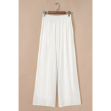 White vacation resort wide leg trousers from Trendsi with elastic waistband and relaxed fit