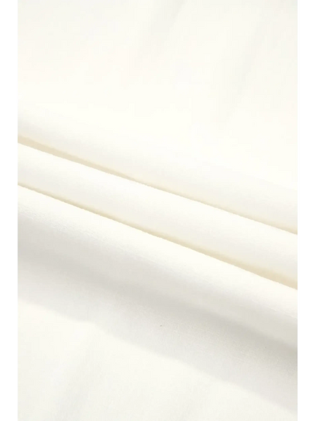 Close-up of white fabric texture for Trendsi vacation resort wide leg trousers