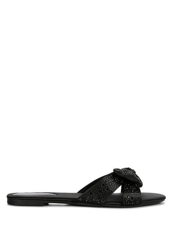 Rag Company black flat sandals with perforated design and decorative bow detail
