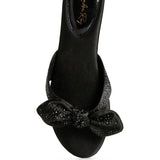 Rag Company black sandals with glitter bow accent and cushioned footbed for stylish comfort