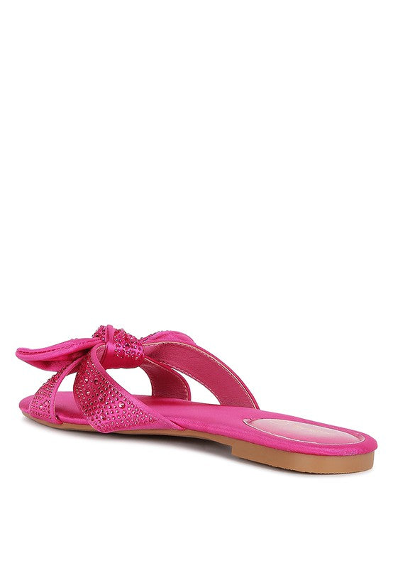 Rag Company pink flat sandals with decorative bow and rhinestone detail open toe design
