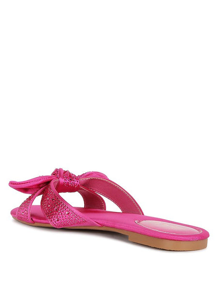 Rag Company pink flat sandals with decorative bow and rhinestone detail open toe design