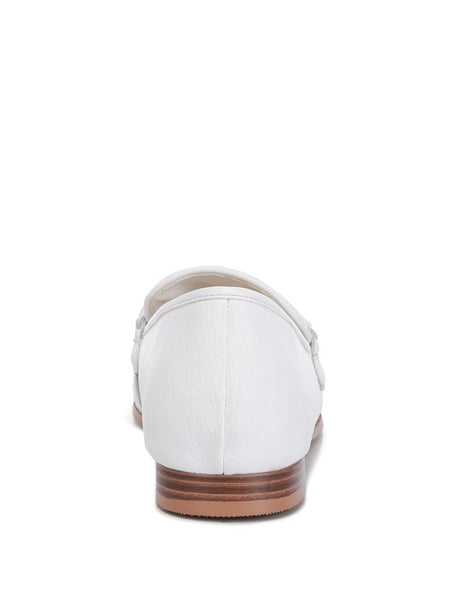 White Rag Company loafers with brown wooden sole viewed from the back