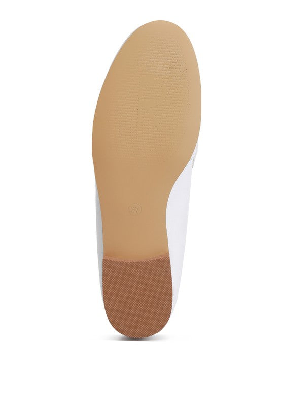 Rag Company loafers showing the textured beige sole and brown heel grip for added traction