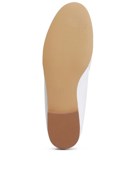 Rag Company loafers showing the textured beige sole and brown heel grip for added traction