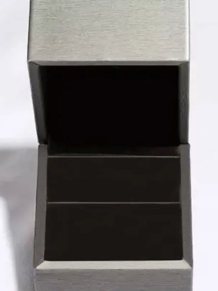 Empty gray jewelry box designed to hold 2 carat moissanite heart earrings from Trendsi