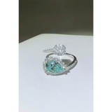 Babe Beachwear 2 carat pear shaped Bypass ring sparkle with clear and blue gemstones on silver band