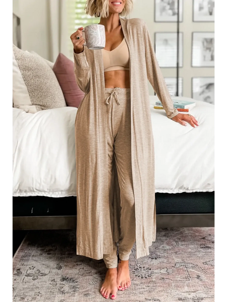 Trendsi 2 Pc Pants and Duster Leisure Set in beige worn by woman holding a mug indoors