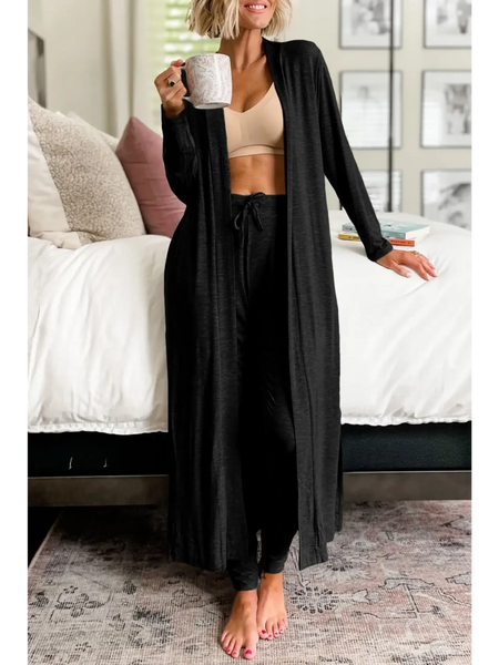 Trendsi 2 Pc Pants and Duster Leisure Set in black soft fabric worn indoors with drawstring pants and long open duster
