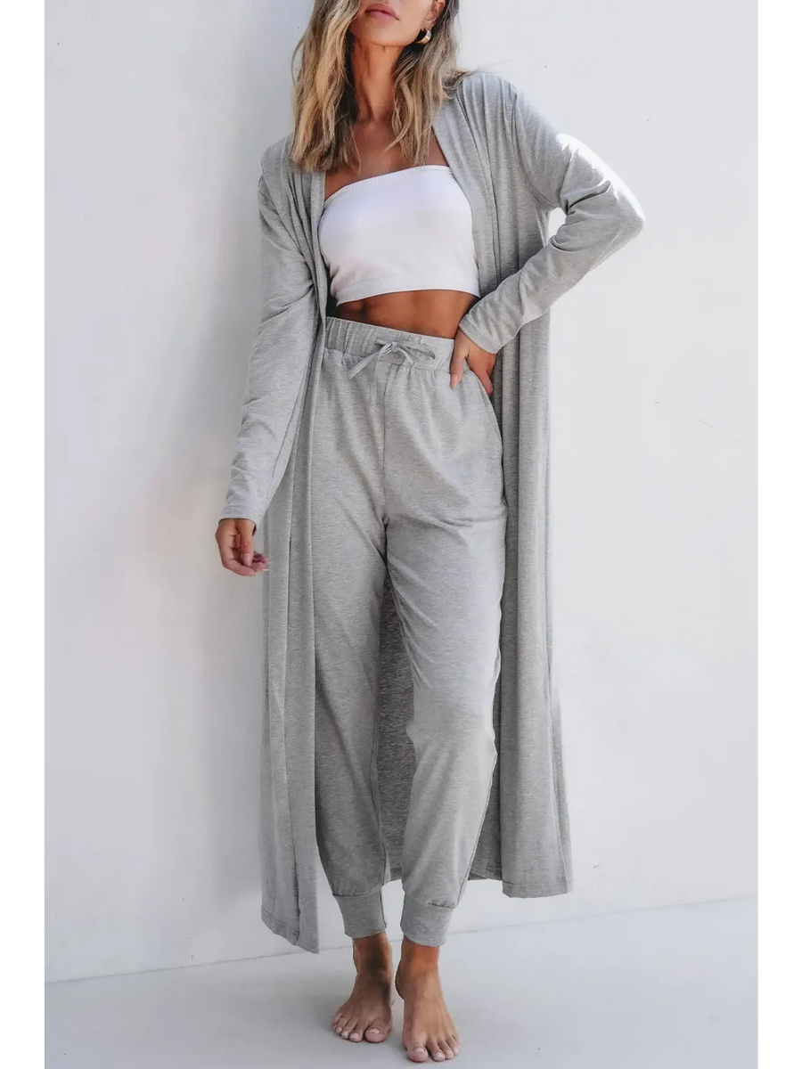 Trendsi 2 Pc Pants and Duster Leisure Set in light gray worn by woman with white tube top