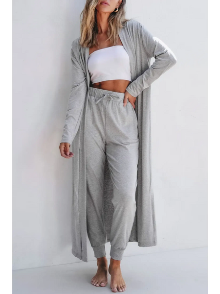 Trendsi 2 Pc Pants and Duster Leisure Set in light gray worn by woman with white tube top