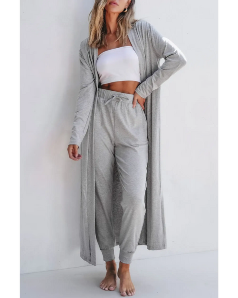Trendsi 2 Pc Pants and Duster Leisure Set in light gray worn by woman with white tube top