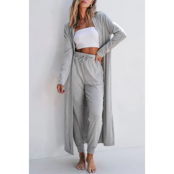 Trendsi 2 Pc Pants and Duster Leisure Set in light gray worn by woman with white tube top
