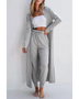 Trendsi 2 Pc Pants and Duster Leisure Set in light gray worn by woman with white tube top