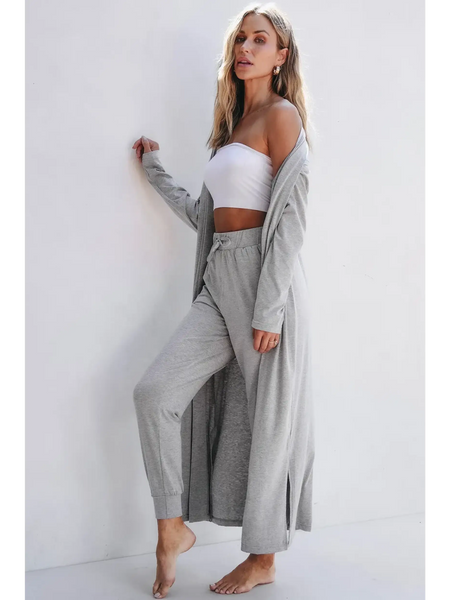 Trendsi 2 Pc Pants and Duster Leisure Set in light gray worn by woman posing barefoot