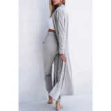 Trendsi 2 Pc Pants and Duster Leisure Set in light gray worn by woman barefoot against white background