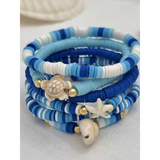 Trendsi blue stackable beach bracelets with sea shell and starfish charms in various shades of blue and white