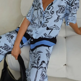 Blue summer lounge set for curvy women by Trendsi with artistic black print and relaxed fit