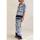 Trendsi blue summer lounge set for curvy women featuring relaxed fit pants and printed button-up top