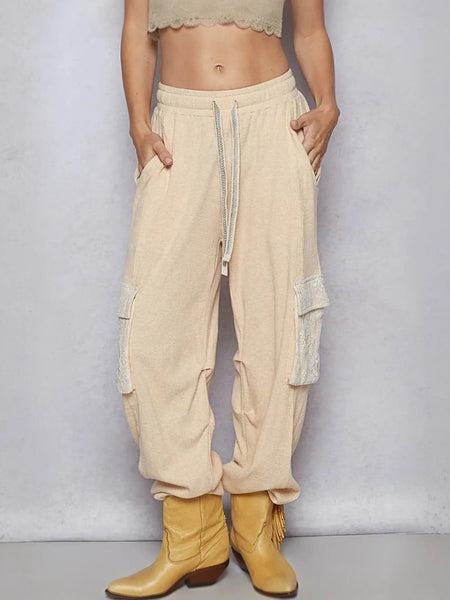 Trendsi beige Cargo Pants with drawstring waist and side pockets styled with tan boots