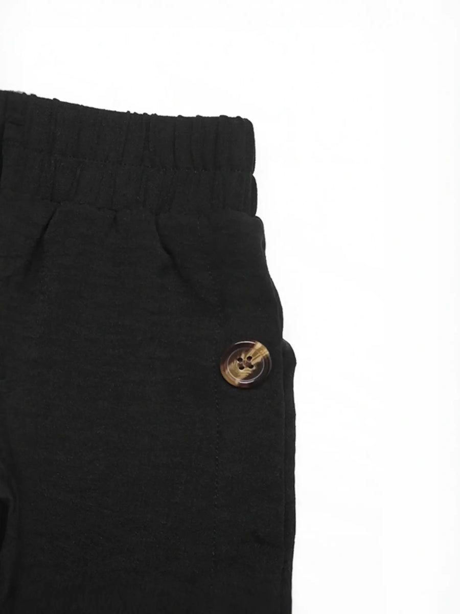 Babe Beachwear black maxi skirt with elastic waistband and button detail casual chic vacation skirt