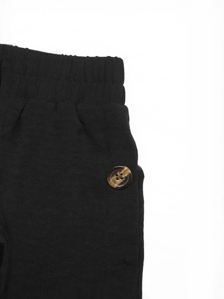 Babe Beachwear black maxi skirt with elastic waistband and button detail casual chic vacation skirt