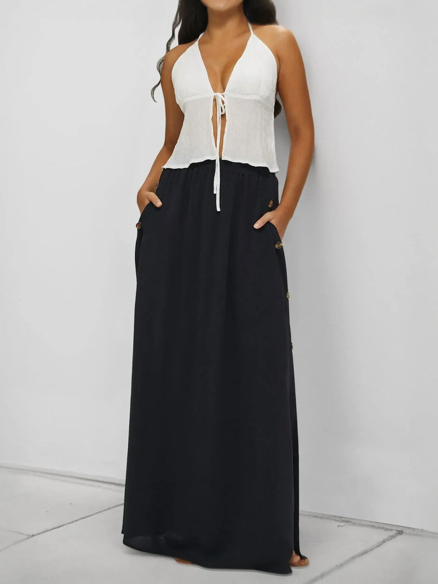 Babe Beachwear black maxi skirt styled as casual chic vacation skirt with side pockets