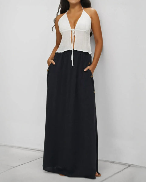 Babe Beachwear black maxi skirt styled as casual chic vacation skirt with side pockets