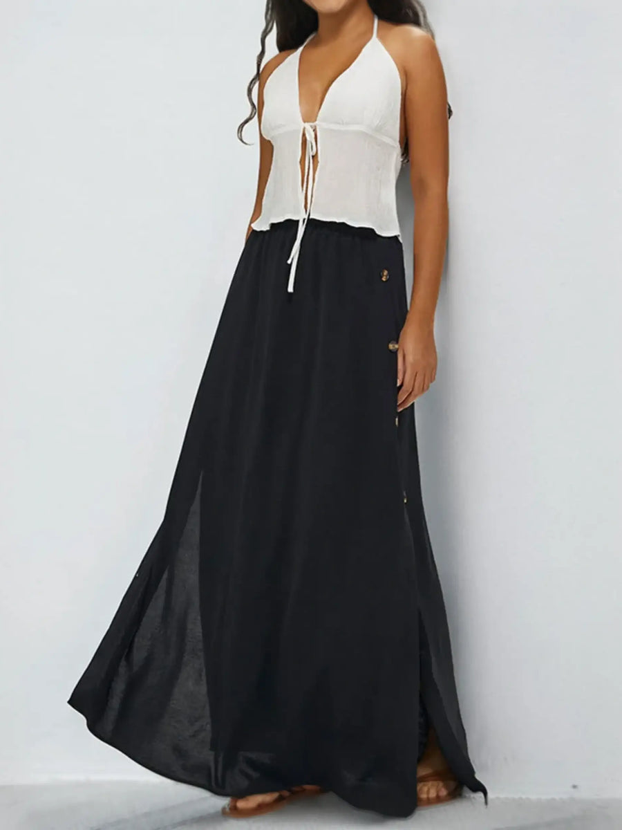 Babe Beachwear black maxi skirt with side buttons styled as casual chic vacation skirt