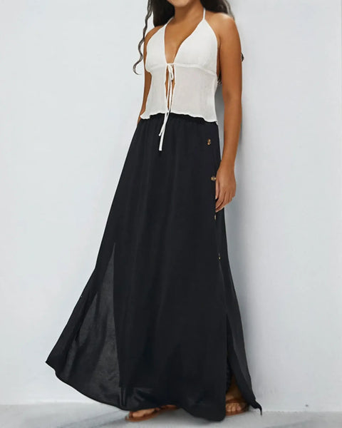 Babe Beachwear black maxi skirt with side buttons styled as casual chic vacation skirt