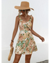 Babe Beachwear chic floral sundress for women with ruffle straps and tropical print worn with sun hat and sunglasses