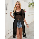 Babe Beachwear chic lightweight beach cover up in black mesh with fringe hem over swimwear