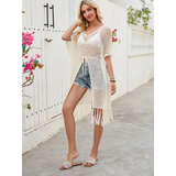 Chic lightweight beach cover up by Babe Beachwear worn over shorts with fringe detailing