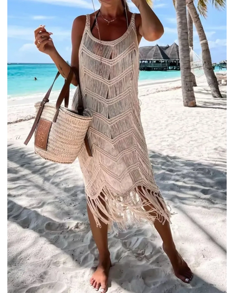 Babe Beachwear chic tassel beach dress coverup in beige with fringe details worn on sandy tropical beach