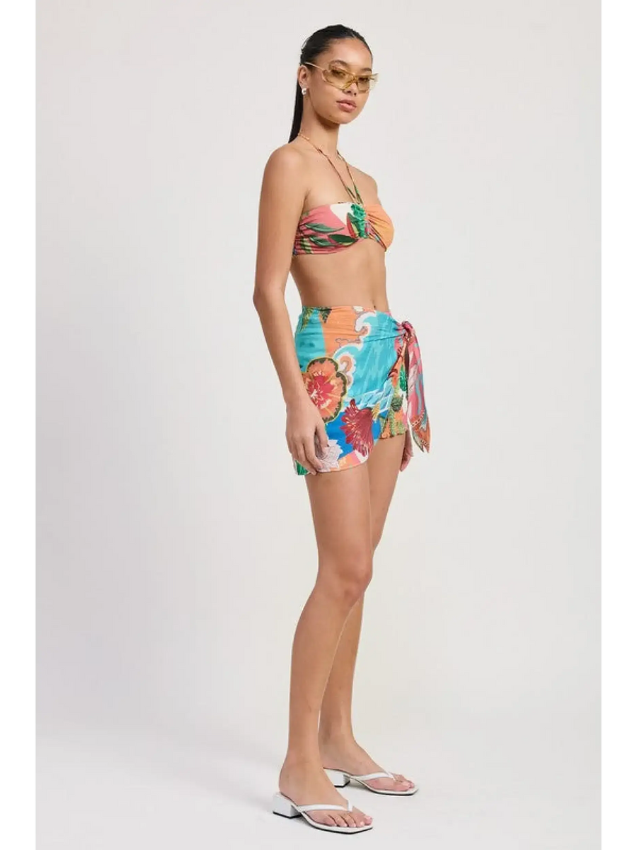 Emory Park chic vacation sarong skirt with vibrant tropical floral print worn with matching bikini top