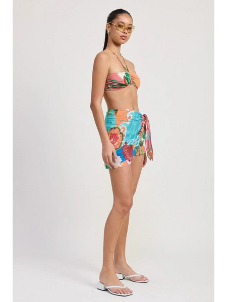 Emory Park chic vacation sarong skirt with vibrant tropical floral print worn with matching bikini top