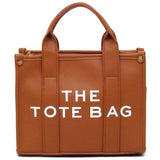 Fashion World brown leather Compact Tote Bag Satchel with sturdy handles and structured design