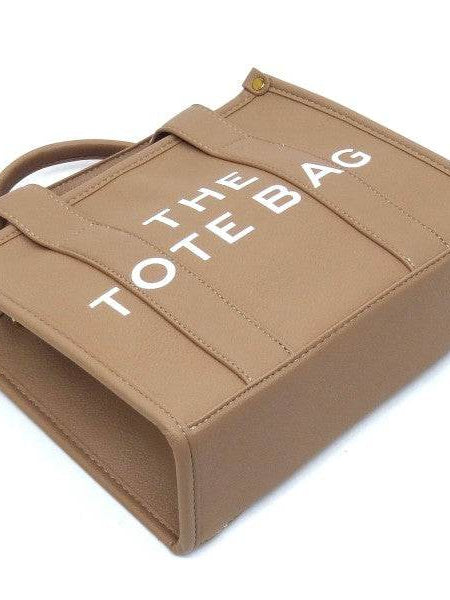 Fashion World Compact Tote Bag Satchel in tan with white printed text and sturdy handles
