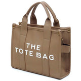 Fashion World Compact Tote Bag Satchel in beige with sturdy handles and white lettering