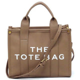 Fashion World compact tote bag satchel in taupe with top handles and adjustable shoulder strap