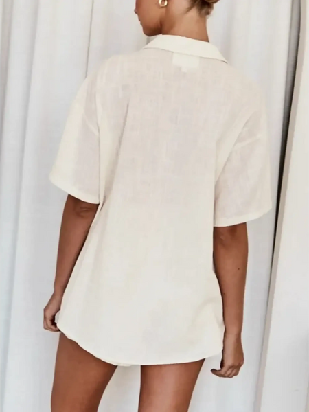 Woman wearing a loose beige embroidered shorts set for women with short sleeves and collar from Trendsi