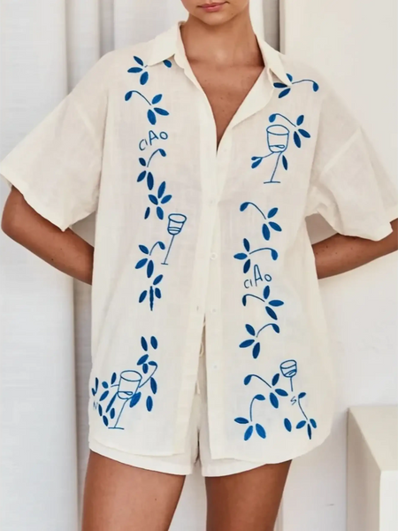 Trendsi embroidered shorts set for women in cream with blue floral and wine glass embroidery